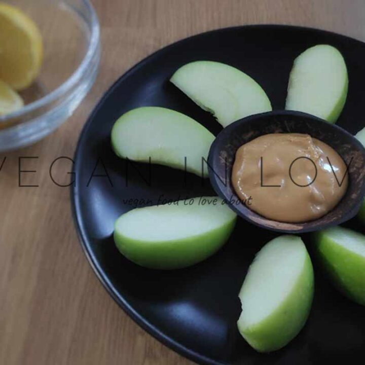Green apple with peanut butter