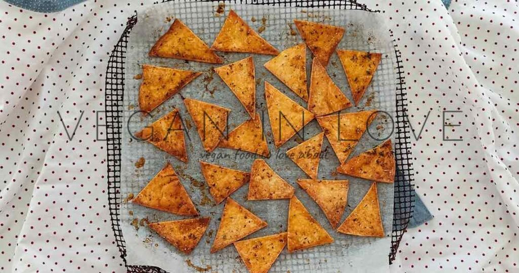Delicious, quick, simple, & easy to make these baked tortilla chips. They are made with tortilla wraps & with aromatic herbs. Enjoy this recipe as a great snack