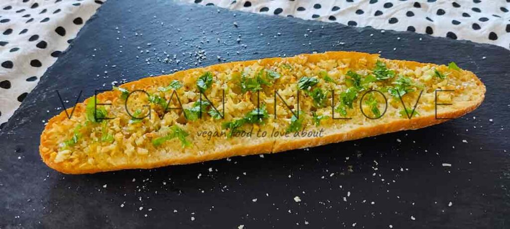 This homemade vegan garlic bread is incredibly delicious and is made of easy, simple, and affordable ingredients. Enjoy this recipe as a great side dish.