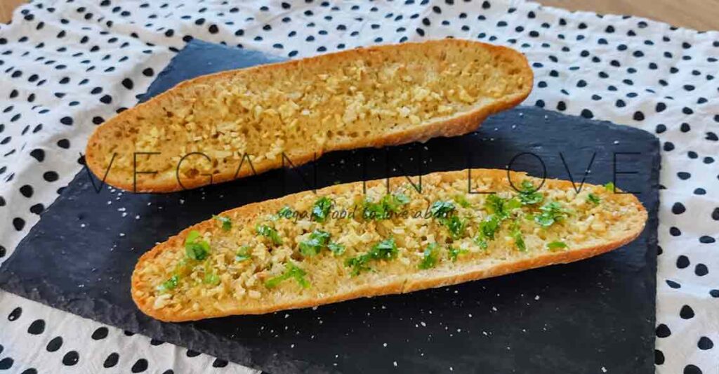 This homemade vegan garlic bread is incredibly delicious and is made of easy, simple, and affordable ingredients. Enjoy this recipe as a great side dish.