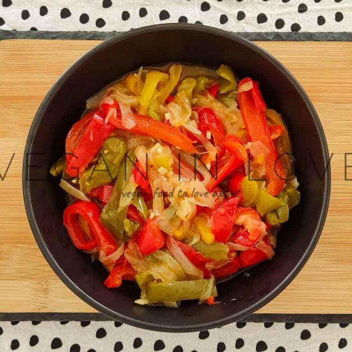 This delicious side dish is super easy and simple to make. Enjoy these sauteed peppers and onions as a great side dish together with vegan burgers and more!
