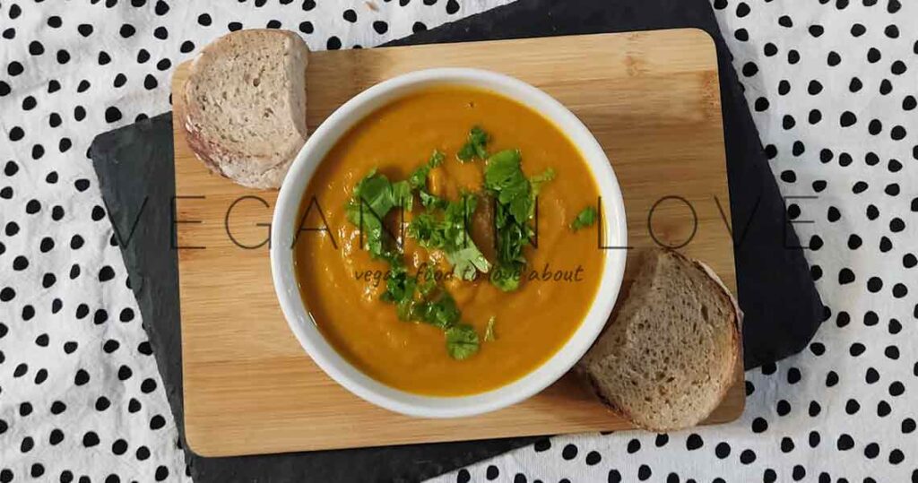 Delicious, aromatic and flavorful carrot soup with fresh chopped coriander. Enjoy this warm, easy-to-make, and comforting soup as a great starter or as a main dish.
